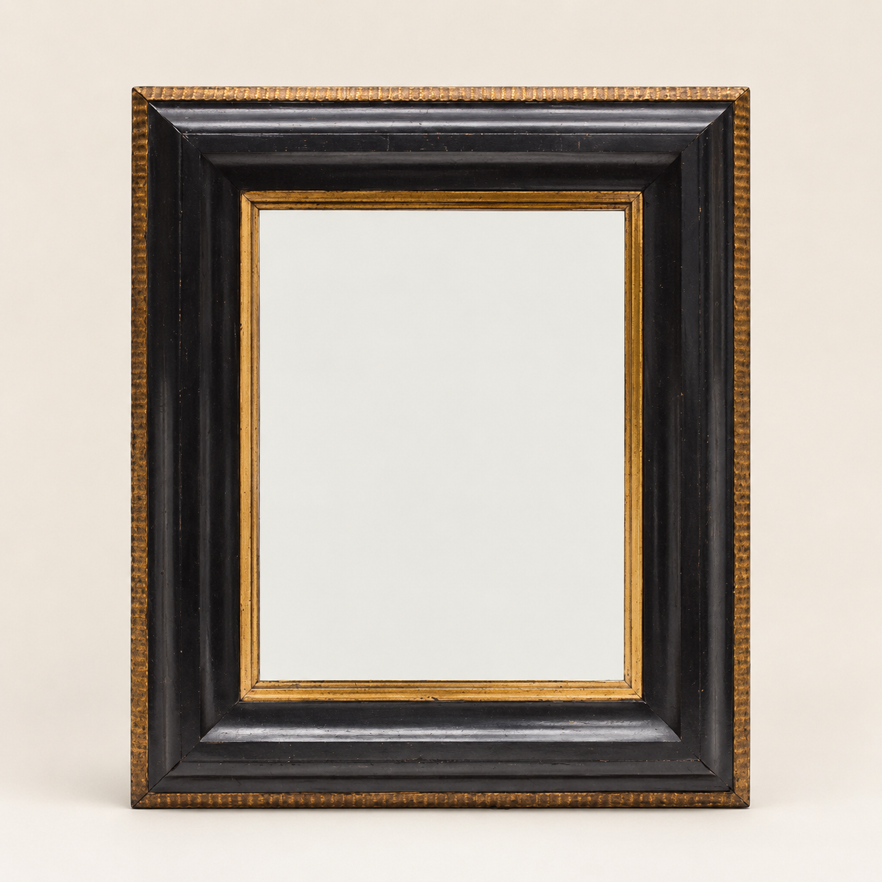 Early 20th Century Ebonized and Gilt Wood Wall Mirror