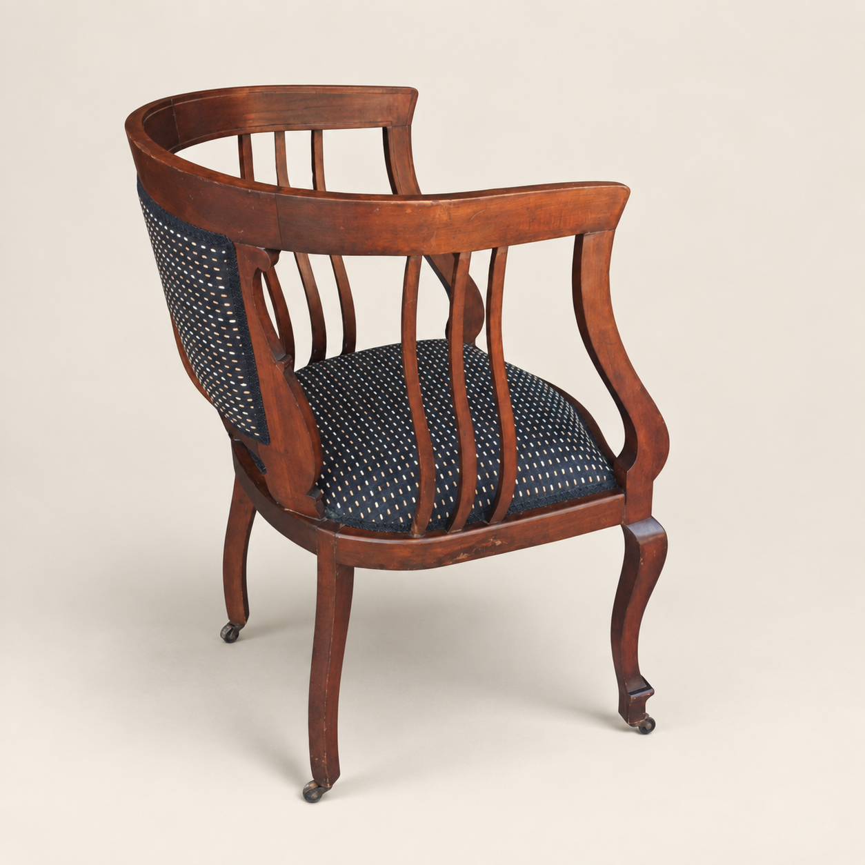 Late 19th/Early 20th Century Georgian-Style Mahogany Library Chair on Casters