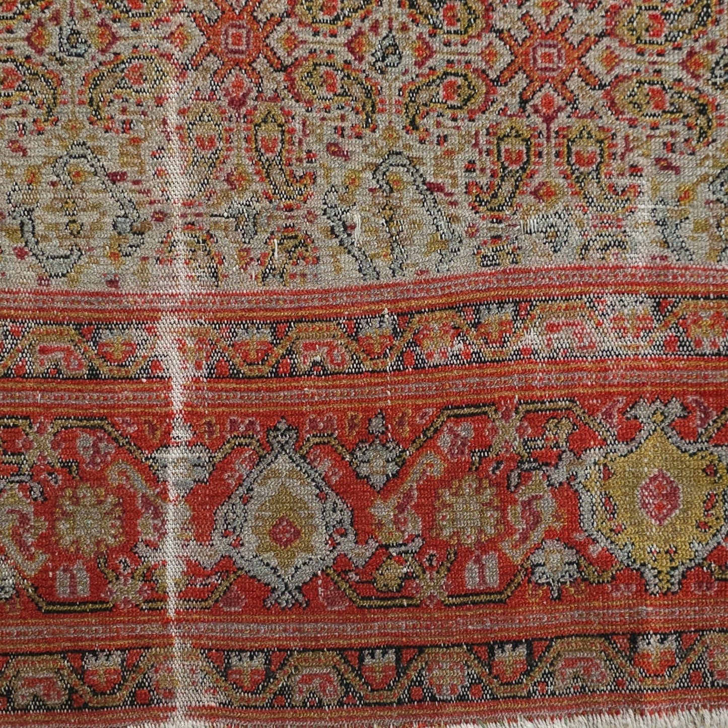 Early 20th Century Persian Rug in Rose, Deep Blue, and Brown