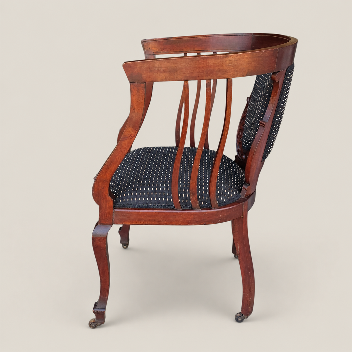 Late 19th/Early 20th Century Georgian-Style Mahogany Library Chair on Casters